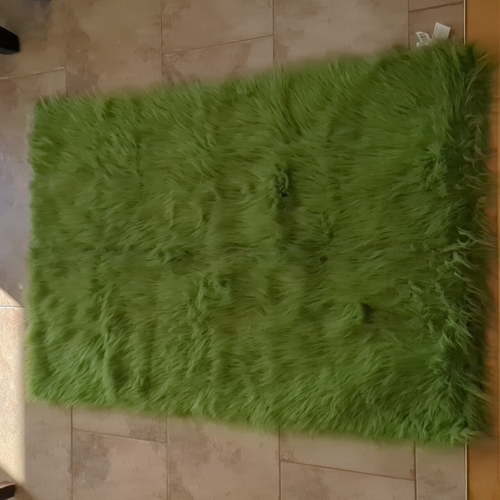 Green faux fur rug